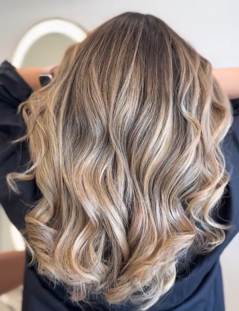 Blowdry with curling iron styling at MAK Salon